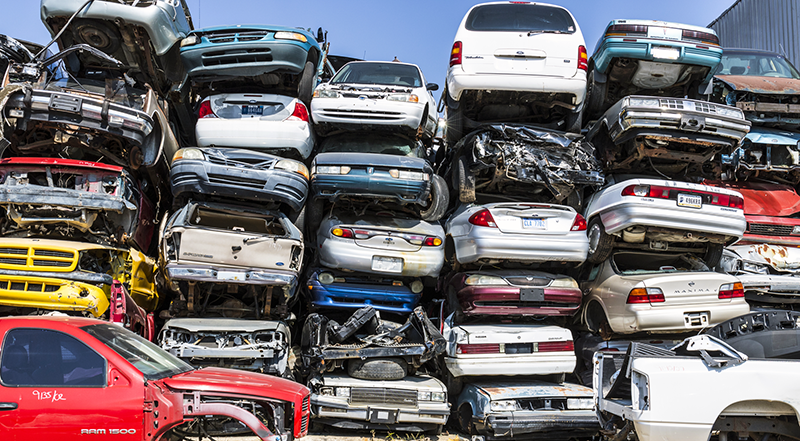 Many broken cars after a traffic accident in the parking lot of a