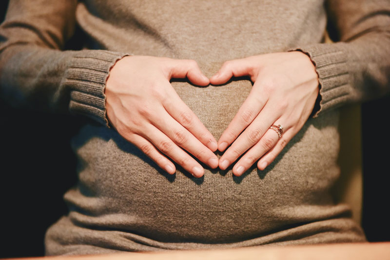 Pregnant-with-Heart-Hands